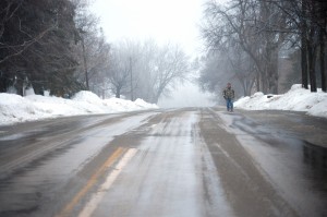 Man walking road in Ashby, MN
