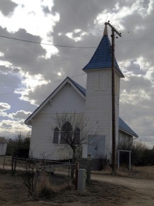 Blue roofed church in Sweetgrass, Montana