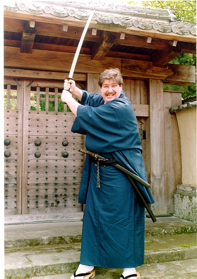 Wielding an authentic Japanese katana at a history center in Takata for a TV show.