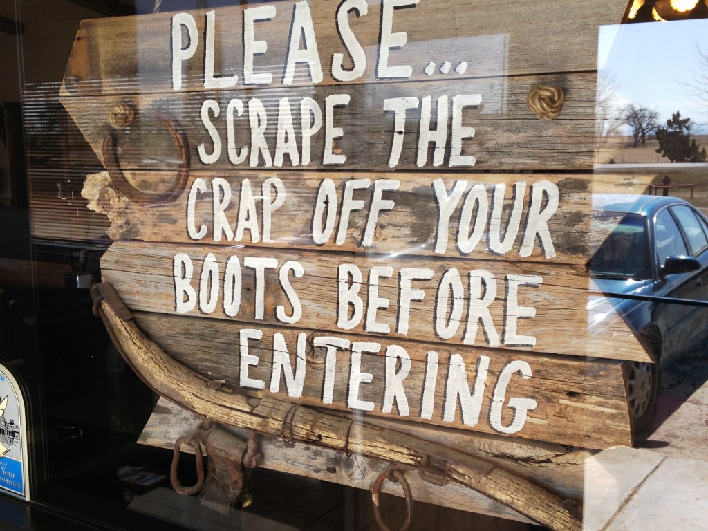 Sign at the door of TJ's Cafe in Newell, SD. Bear in mind this is sheep country.