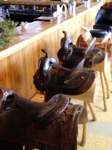 Bar Stools (or should I say saddles) at TJ's Cafe in Newell, SD