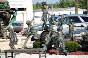 Bronze of children playing in front of Garden Palace Hotel in Williamsville, NY