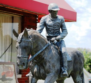 Horse and rider outside of Rebecca Ruth Candy Shop in Frankfort, Kentucky