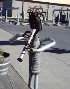 Flute Player made from mufflers at Melody Muffler in Walla Walla, Washington