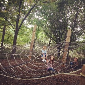 The kids got all tangled up in this giant spider web at Arbor Day Farm (by Marissa Noe)