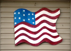 A nice handcrafted flag decorates a house in Nebraska City