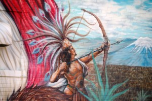 Closeup of an Aztec shooting an arrow