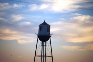 Sunrise colors behind the Sapp Brothers Coffee Pot Water Tower in Nebraska City, NE