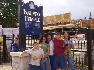 Family at the Nauvoo Temple under construction in Nauvoo, Illinois. Summer 2001