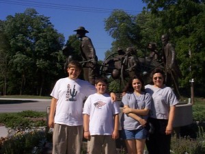 Seth, Solomon, Marissa and Julianne at Winter Quarters monument at Mormon Trail Center in Omaha, Nebraska, Summer 1999