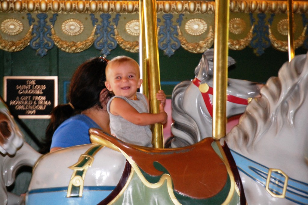 Lyla rides the old 1930s St. Louis Carousel in Sept. 2013
