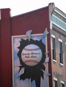 Giant Baseball breaking a Window in downtown Louisville