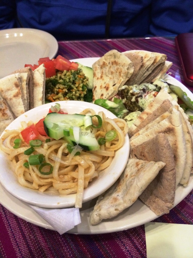 My meal at Myra's Dionysus - a pesto fettucine, some bread and hummus.