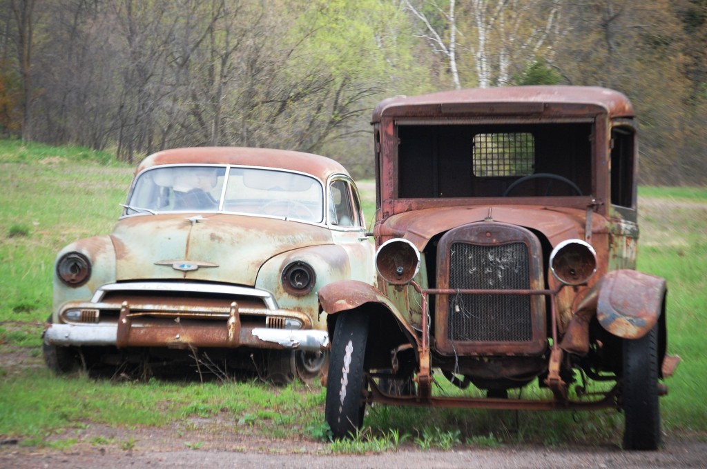 A couple of old cars near Hurley, WI as seen from Route 2