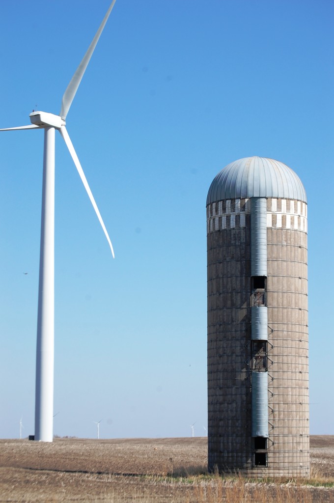A silo and wind turbine coexist near Nekoma, ND