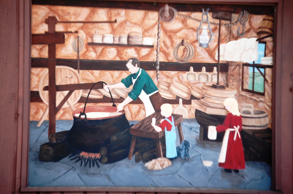 One of the two murals that decorate the outside of Ellenbach's Cheese Chalet