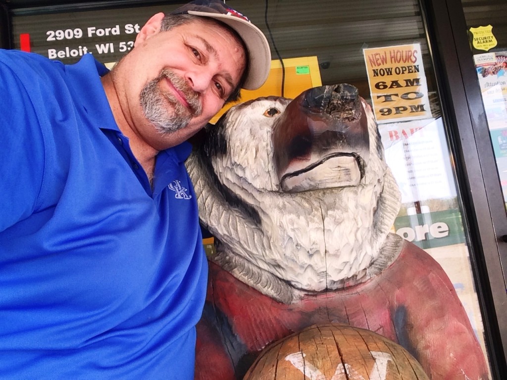 Cuddling with the Honey Bear in the front of Cornellier Superstore