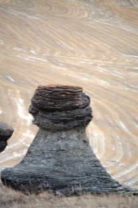 A giant hoodoo overlooks the prairie valley below at Jerusalem Rocks near Sweetgrass, Montana