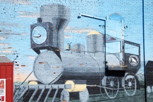 Train mural in Glasgow Montana on the side of a building