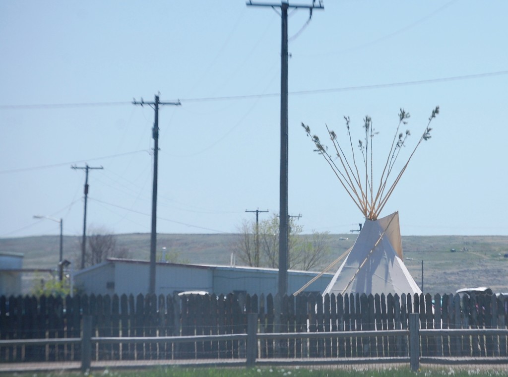 When I passed through Fort Belknap, there was a Pow Wow going on.  You can see the Tipi over the fence.