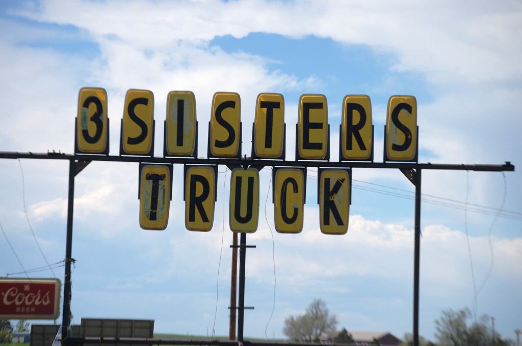 3 Sisters Truck Stop sign near Manville, WY