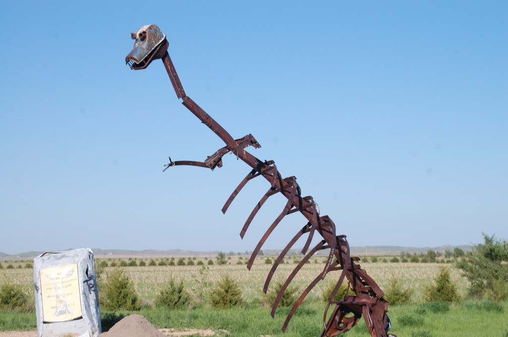 A 15 foot dinosaur overlooks Carhenge