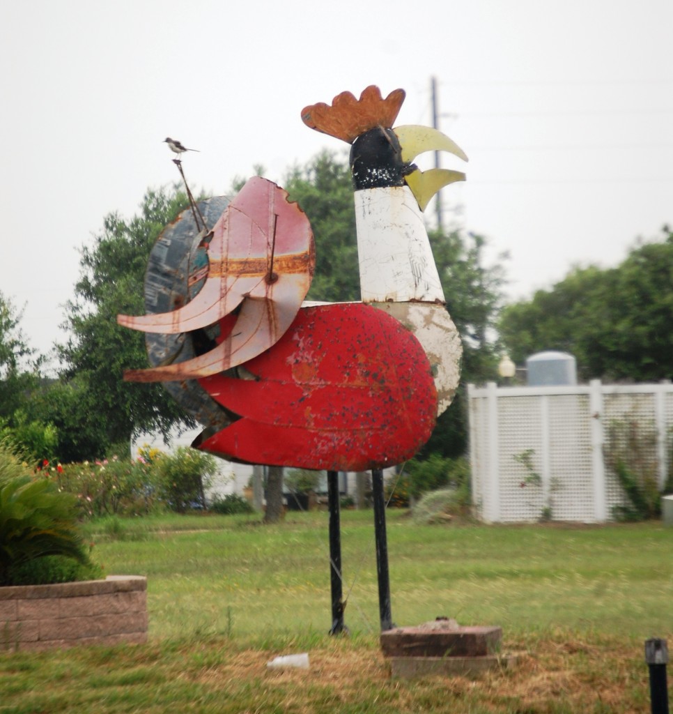 A big metal rooster sits in front of the Jay Cafe...doesn't look like a jay to me.