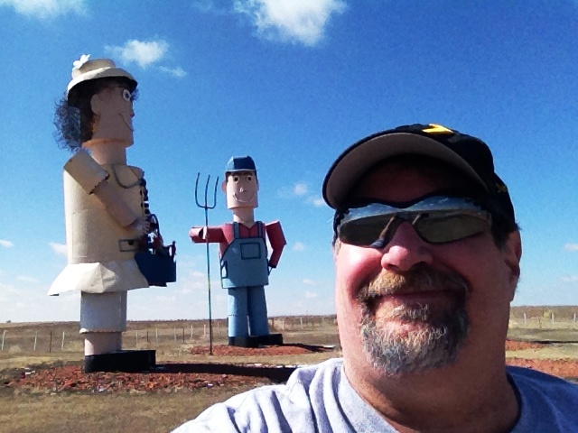 Sumoflam visiting the Tin Family, another large set of metal sculptures on the Enchanted Highway