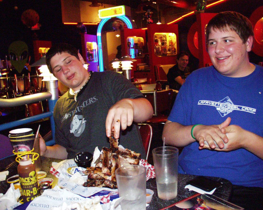 Finishing off a pile of ribs at Space Aliens back in 2005