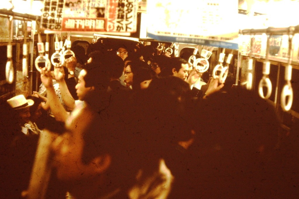 Crowded subway in Nagoya...all black heads