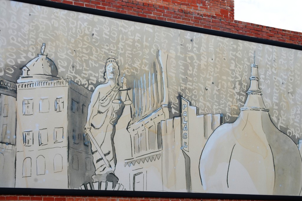 A mural in Georgetown that depicts some of the towns more famed buildings