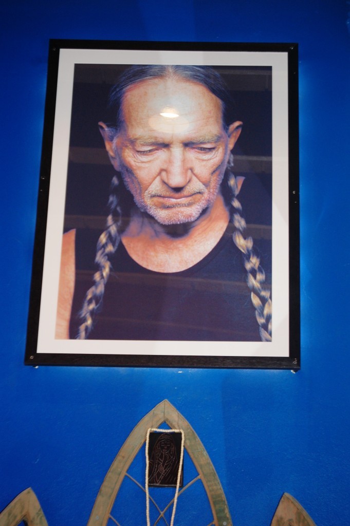 Willie Nelson Portrait above his shrine 