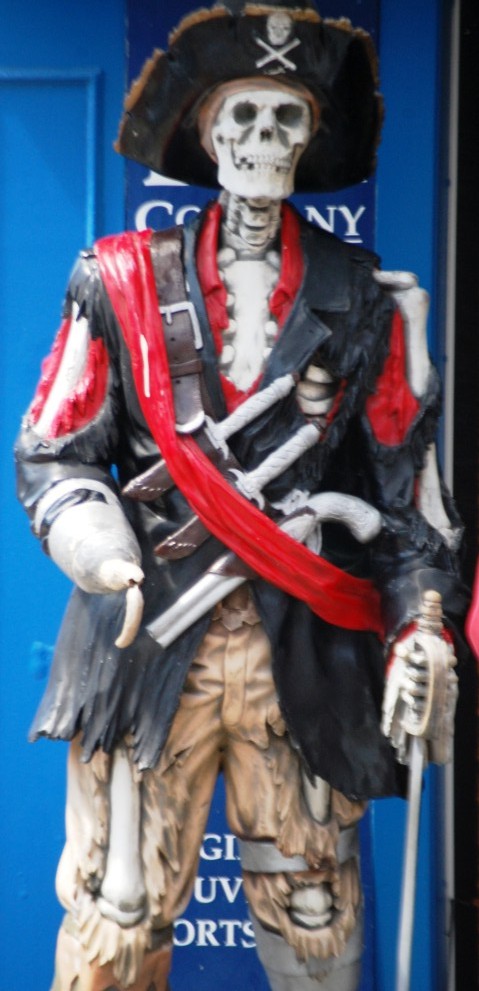 A skeleton pirate guards the entrance to a shop in Fisherman's Wharf