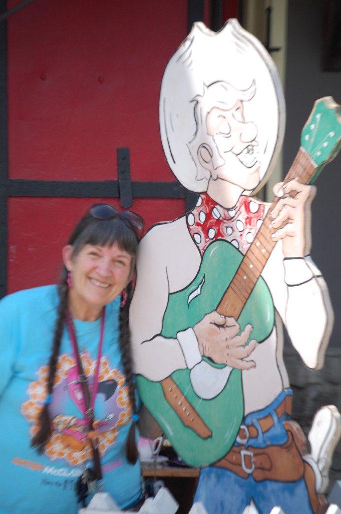 "Christmas" Carla (her birthday is on Christmas) poses with a singing cowboy in Upper Lake as we think about Antsy McClain