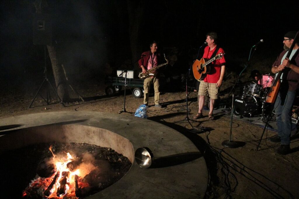 Singing around the campfire at Woodflock