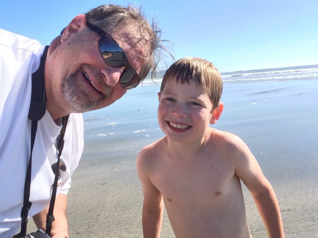 Grampz with grandson Charles on the beach in Neah Bay, WA