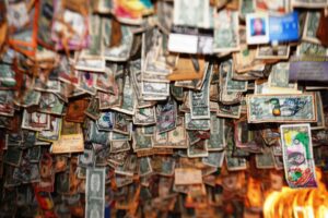 Dollar Bills plaster every inch of the walls and ceiling of fat Smitty's