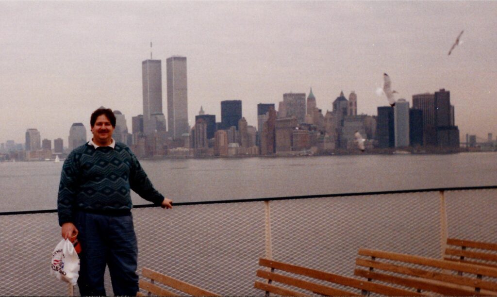 I visited NYC in 1990 and this is a photo with the original World Trade Center Twin Towers. 