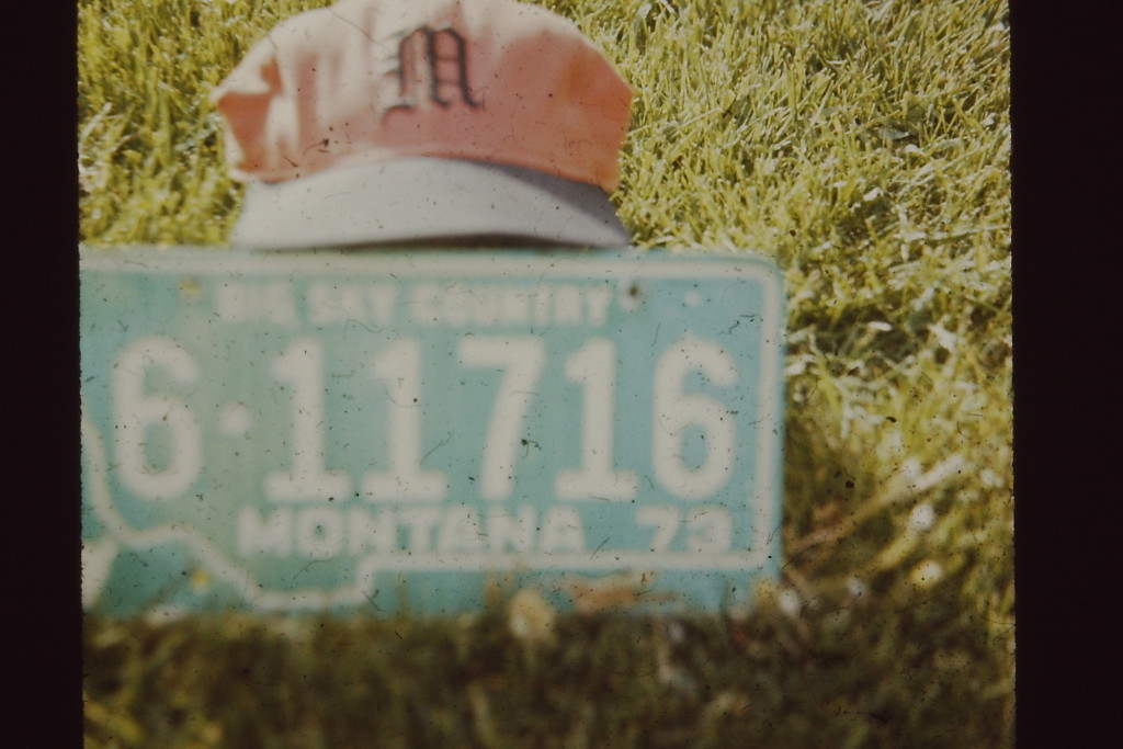Took this photo of our Montana license plate with a Murray High School (UT) hat in 1976