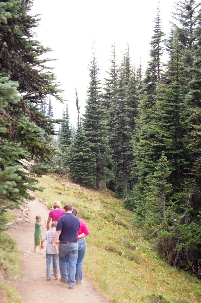 Family all walking along the trail from Tipsoo Lake