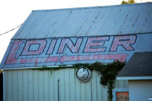 Midway Diner sign on a barn