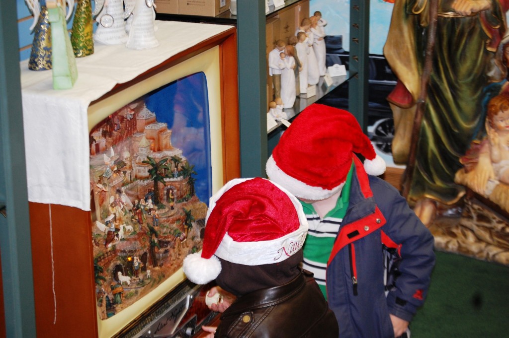 Kids fascinated by Silent Night musical diorama