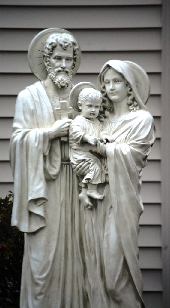 A statue of Joseph, Mary and Jesus in front of Saint Nicholas Catholic Church. Most Catholic churches just have a Mary...so this was unique