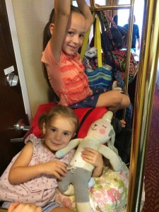 The kids hitched a ride on the luggage rack....