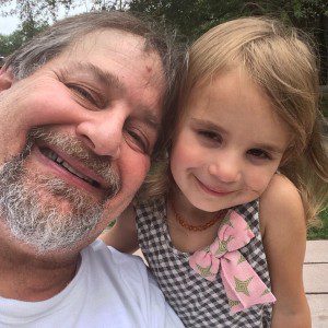 Hanging with granddaughter Lyla on a break on the return trip home to Kentucky