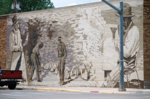 Harvey Jackson mural on a corner in Kemmerer, WY