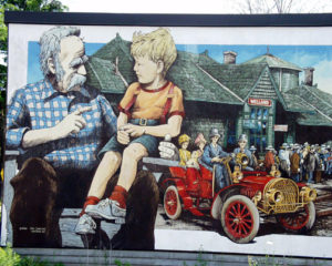 Mural of Grandfather telling stories about Welland to Grandson