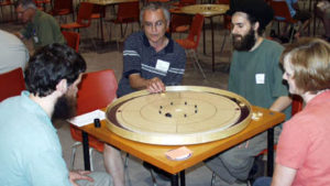 Playing Crokinole at the 2008 International Crokinole Championships in Tavistock, Ontario