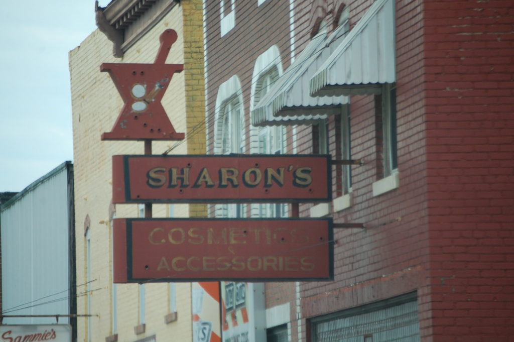 An Old Pharmacy sign in downtown Ravenna. I love old signs like this.