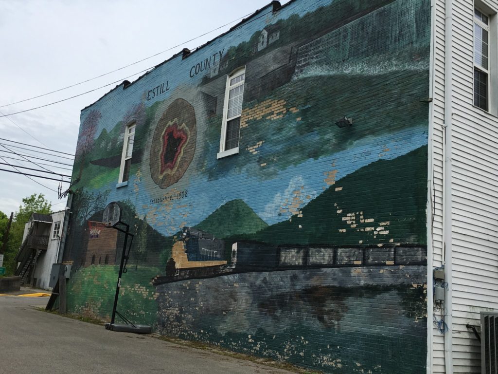 Another large mural can be seen as one crosses the Kentucky River on KY 89 coming from the south into Irvine. It features a red geode, something else that Irvine is famous for.